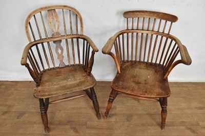 Lot 1122 - Two early 19th century ash and elm stick back country chairs