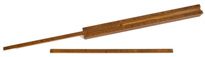 Lot 817 - An early 19th century boxwood 12" four-section slide rule, by Dring & Fage, 20 Tooley St, London Bridge, comprehensively inscribed with scales and calculations, c.1804 - 1844.