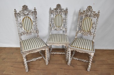 Lot 1246 - Set of three antique heraldic themed side chairs