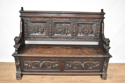 Lot 1261 - 19th century Belgian carved oak settle