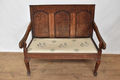 Lot 1262 - 18th century oak settle, with three panel back and pad seat on cabriole legs, 110cm wide