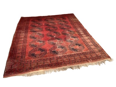 Lot 1292 - Tekke style rug, with three rows of six quartered medallions in main meander border, 362 x 275cm