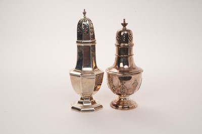 Lot 441 - Two silver sugar castors, one of balusters form with applied strap work decoration (Sheffield 1912), the other of octagonal baluster form (Sheffield 1908) approximately 13oz.