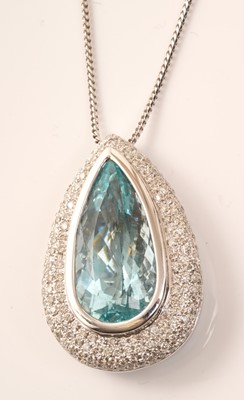 Lot 583 - Large aquamarine and diamond pendant with a pear-cut aquamarine surrounded by a pavé set diamond border in 18ct white gold, on chain