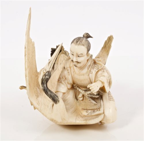 Lot 668 - Late 19th century Japanese carved and stained...