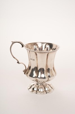 Lot 454 - William IV silver christening mug with melon shape body on pedestal foot, by William Knight II, London 1834, height 11cm. Approximately 7oz.