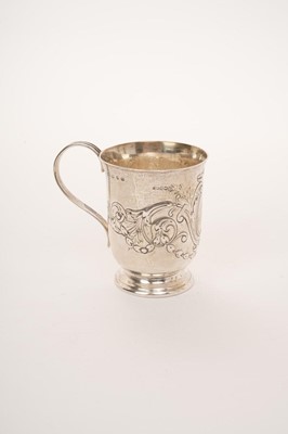 Lot 455 - Late Victorian silver christening mug with repoussé floral decoration on circular foot, Birmingham 1892, 9cm, 3.5oz