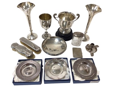 Lot 461 - Group of silverware to include a pair of trumpet shape vases, two silver trophies, three silver Royal Yacht Club Armada dishes, etc