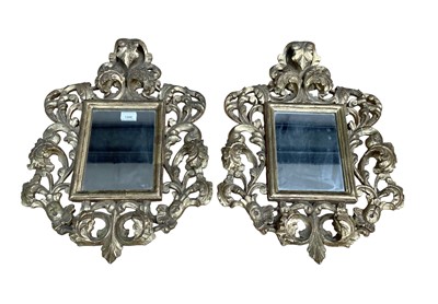 Lot 1288 - Pair of Florentine carved and gilded wall mirrors