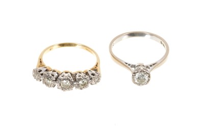 Lot 448 - Diamond single stone ring and a diamond five stone ring (2)