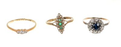 Lot 449 - Sapphire and diamond cluster ring, emerald and diamond cluster ring and a diamond three stone ring (3)