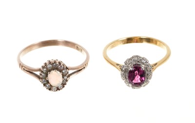 Lot 451 - Ruby and diamond cluster ring in 18ct gold setting and an Edwardian opal and seed pearl cluster ring in 9ct gold setting (2)