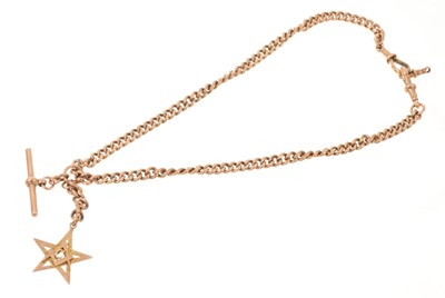 Lot 489 - Edwardian 9ct rose gold watch chain with solid curb links and a rose gold Masonic pendant fob