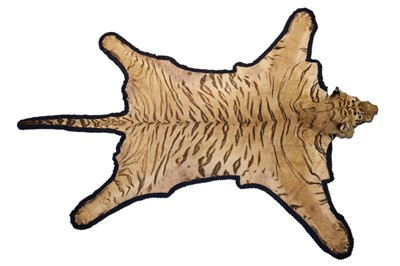 Lot 869 - Fine 1940s Van Ingen Tiger skin rug, the underside numbered 31708 with records stating it was delivered to Van Ingen on July 23rd 1945 by Sir William Ibbotson. 313cm nose to tail, 212cm paw to paw.