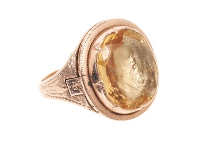 Lot 408 - 19th century gold and topaz poison ring with intaglio bezel