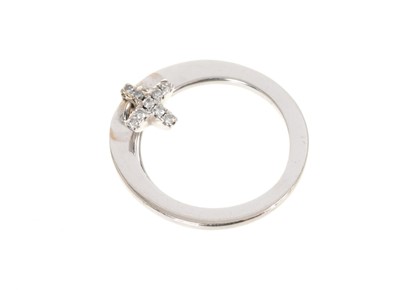 Lot 444 - Italian 18ct white gold ring with a diamond 'kiss' by Gazi, Italy.