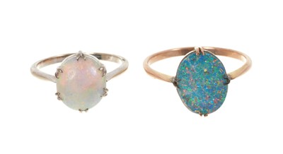 Lot 452 - Two 9ct gold set opal rings