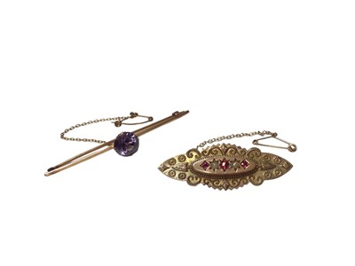 Lot 80 - Victorian 9ct gold pink stone and seed pearl mourning brooch and a single stone alexandrite yellow metal bar brooch (2)