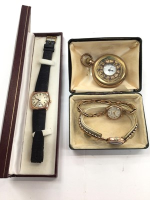 Lot 1011 - Two vintage 9ct gold cased ladies wristwatches on plated bracelets, 1930s yellow metal cased watch on leather strap and a gold plated half hunter pocket watch (4)