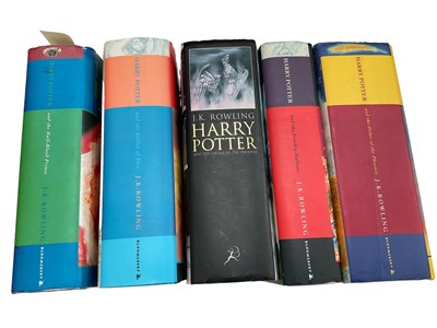 Lot 1730 - First Edition Harry Potter books to include the Half-Blood Prince with rare page 99 printing error with the misprint 'eleven owls'. Order of The Phoenix and Deathly Hallows, others