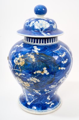 Lot 9 - Pair of 19th century Chinese blue and white baluster vases and covers