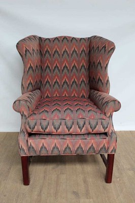 Lot 1316 - Georgian-style flame stitch upholstered wing armchair with loose cushion, on square section under structure