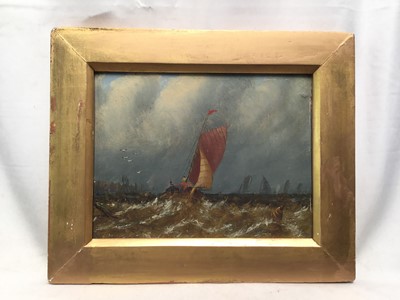 Lot 103 - 19th century English School, oil on artist board, a gaff rigged fishing vessel in a blow off the coast, in gilt frame. 15 x 19cm.