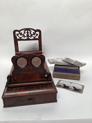 Lot 2602 - Victorian stereoscopic viewer in figured walnut case, together with a set of stereoscopic slides