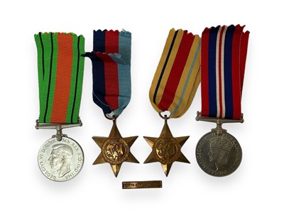 Lot 702 - Second World War medal group comprising 1939 - 1945 Star, Africa Star with North Africa 1942 - 43 clasp, Defence and War medals, in box of issue named to G. Lodge, 29 Sherrards Way, Barnet.