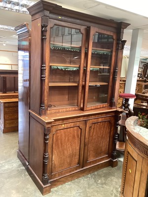 Lot 1286 - Victorian mahogany two height bookcase with glazed doors above