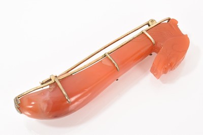 Lot 482 - Chinese jade or red hardstone brooch