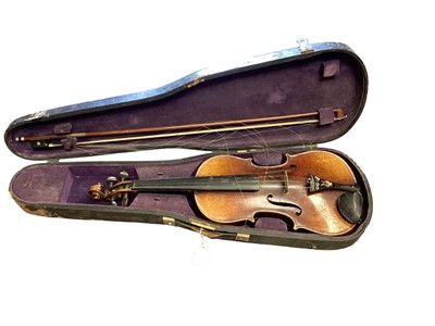 Lot 2200 - 19th century Continental violin, with two piece back and printed label for Stradivarius, with bow in early case