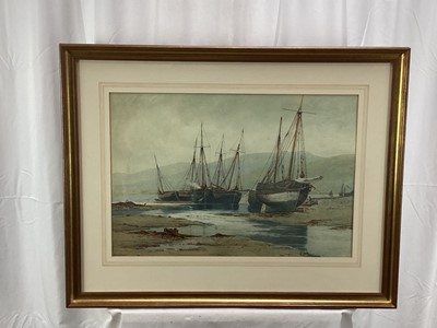 Lot 153 - Charles L. Saunders (1855-1915) - watercolour in glazed gilt frame - fishing boats at low tide