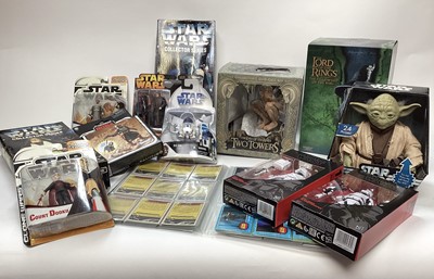 Lot 1867 - Collection of Star Wars and Lord of the Rings figures boxed, Tazos, videos