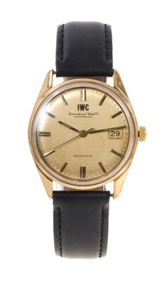 Lot 520 - IWC automatic gold wristwatch on leather strap