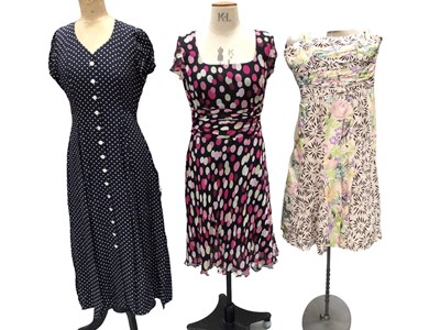 Lot 2061 - Six silk dresses including Donna Morgan, Nanette Lepope, Charlotte Ford, Love and Liberty, plus two floral cotton summer dresses and a white and blue spotty silk cotton mix dress, sizes US 8, 10, 1...