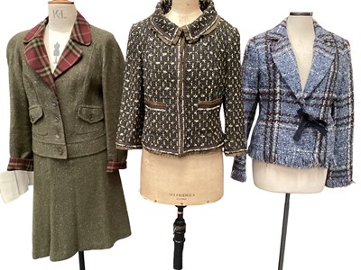 Lot 2068 - Group of Worth clothing including a green tweed skirt suit, size US 6 jacket and US 10 skirt, green tweed jacket, size US 8, blue tweed jacket, size US 6, black wool jacket, size US 6, two knitted...