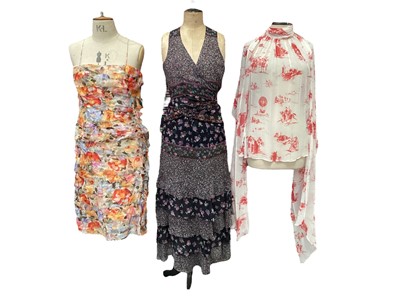 Lot 2071 - Worth silk clothing including two floral matching skirt and top sets, sleeveless top with matching wrap, brown and white polka dot maxi dress, black pleated skirt, sheer jacket with ostrich feather...