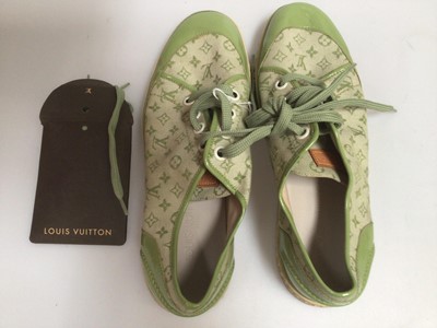 Lot 2087 - Pair of Louis Vuitton green canvas and painted leather monogram trainers, size 40, with spare pair of laces