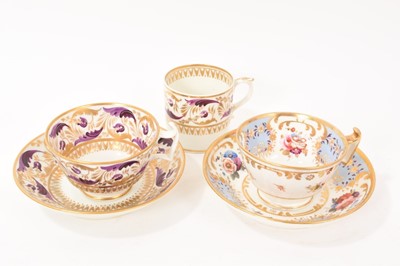 Lot 72 - A Crown Derby trio, with puce and red marks, decorated with a foliate pattern in gilt and purple enamel, together with a 19th century English floral painted cup and saucer, possibly Coalport (5)