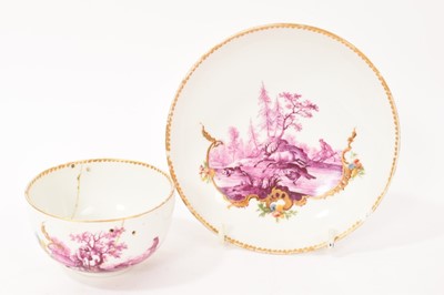 Lot 74 - 18th century Meissen dot period cup and saucer, finely painted in puce with hunting scenes, within polychrome enamelled and gilt borders, the saucer 13cm diameter