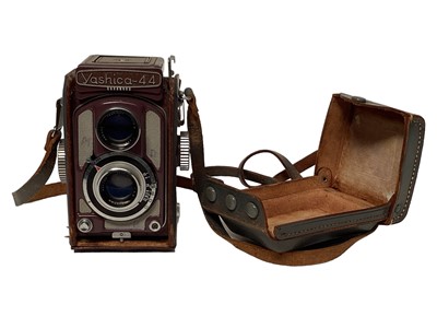 Lot 2353 - Yashica 44 twin lens reflex camera in case, in lavender colour scheme, together with a Yashica-D (2)