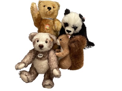 Lot 1801 - Steiff bears Musical Squirrel 038761, 400049, Pummy Panda 036590 and Pelle Panda 027024.