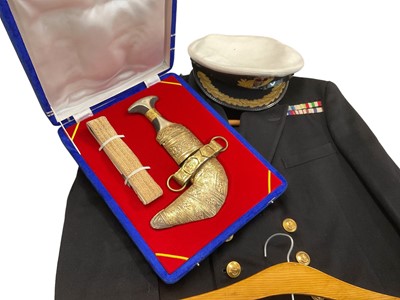 Lot 774 - Elizabeth II Royal Navy officers uniform comprising jacket, trousers and cap, together with a Middle Eastern Jambiya dagger in fitted case.