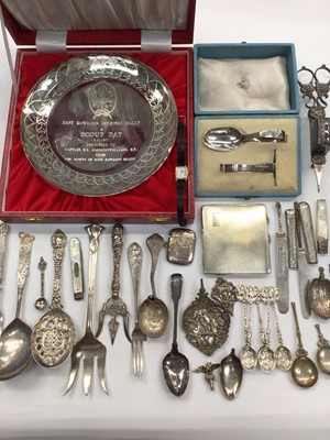 Lot 1026 - Silver cigarette case, silver vesta case, silver baby's spoon and pusher in fitted Asprey box, selection of silver and white metal flatware and a plated Scouts dish in case