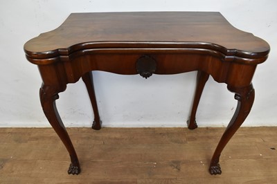 Lot 1330 - George I/II Irish red walnut tea table