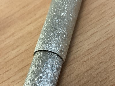 Lot 1037 - Dunhill silver bark effect twin pen set
