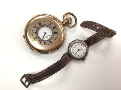 Lot 1001 - Gold plated half hunter pocket watch and a vintage silver cased wristwatch (2)