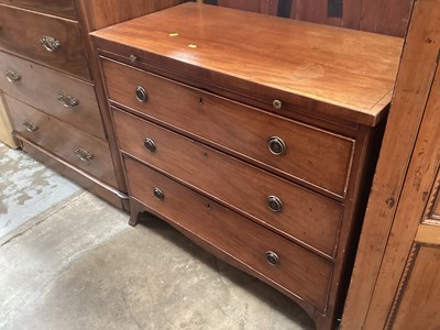 Lot 1270 - Georgian three drawer mahogany chest of drawers with brushing slide on splayed feet