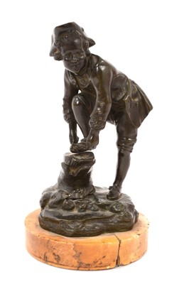 Lot 762 - 19th century French bronze figure of a boy tying his ice skate